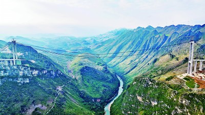 央媒看贵州丨光明日报：在建世界最高桥完成首件钢桁梁吊装